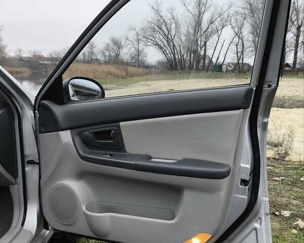 Сірий Кіа Черато, об'ємом двигуна 1.6 л та пробігом 45 тис. км за 6999 $, фото 17 на Automoto.ua