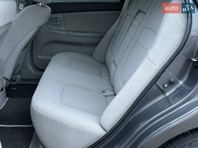 Серый Киа Черато, объемом двигателя 1.98 л и пробегом 213 тыс. км за 4900 $, фото 14 на Automoto.ua