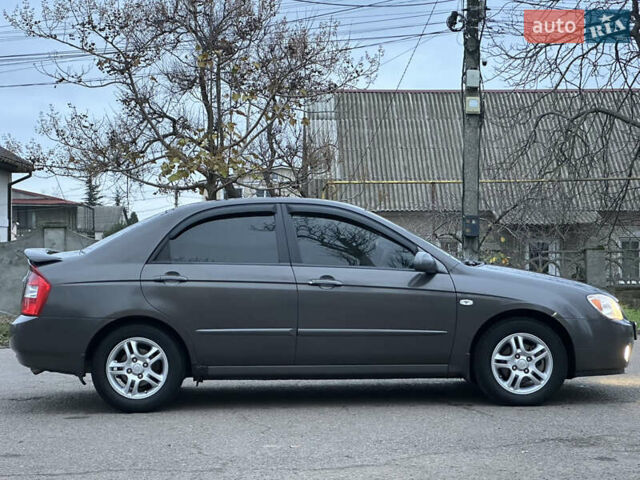 Серый Киа Черато, объемом двигателя 1.98 л и пробегом 213 тыс. км за 4900 $, фото 3 на Automoto.ua