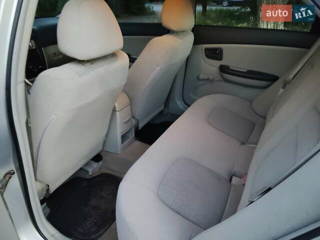 Серый Киа Черато, объемом двигателя 1.6 л и пробегом 89 тыс. км за 2800 $, фото 7 на Automoto.ua