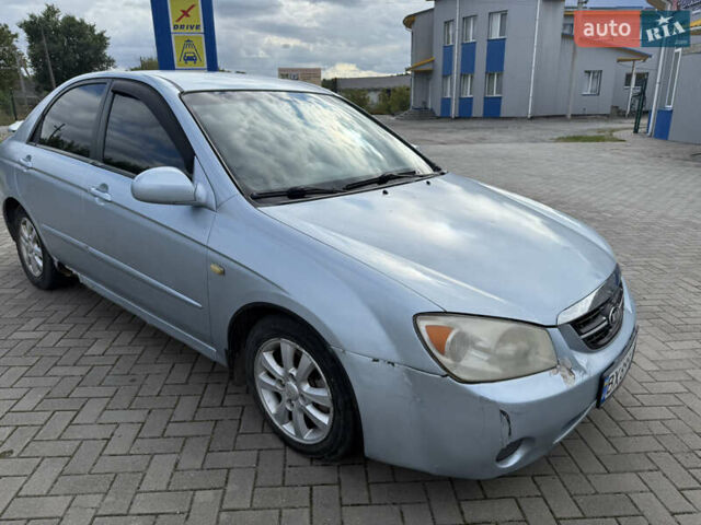 Сірий Кіа Черато, об'ємом двигуна 2 л та пробігом 184 тис. км за 2999 $, фото 6 на Automoto.ua