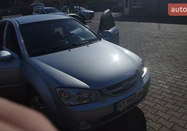 Серый Киа Черато, объемом двигателя 1.98 л и пробегом 255 тыс. км за 4300 $, фото 5 на Automoto.ua