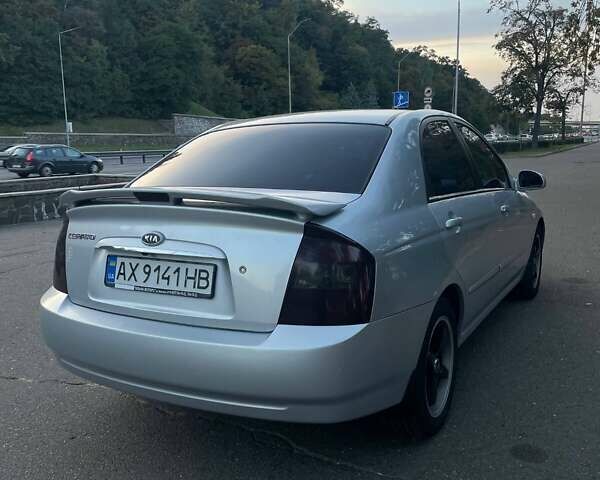Серый Киа Черато, объемом двигателя 2 л и пробегом 350 тыс. км за 4300 $, фото 2 на Automoto.ua