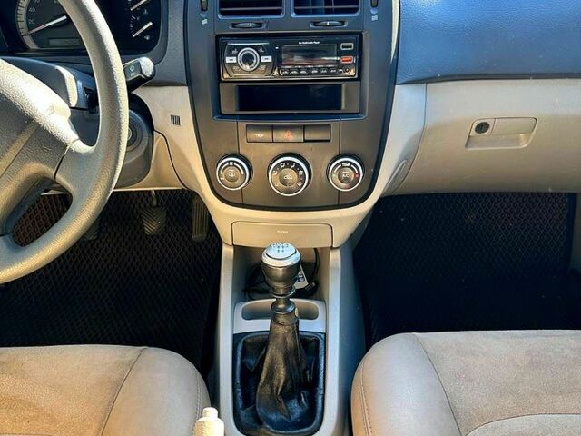 Серый Киа Черато, объемом двигателя 1.6 л и пробегом 325 тыс. км за 2999 $, фото 5 на Automoto.ua