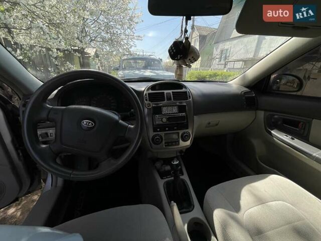 Сірий Кіа Черато, об'ємом двигуна 1.6 л та пробігом 180 тис. км за 4300 $, фото 10 на Automoto.ua