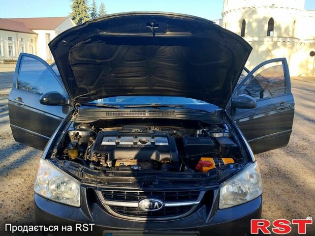 Серый Киа Черато, объемом двигателя 1.6 л и пробегом 255 тыс. км за 4000 $, фото 8 на Automoto.ua