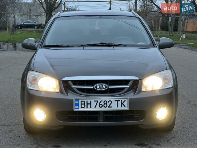 Серый Киа Черато, объемом двигателя 1.98 л и пробегом 213 тыс. км за 4900 $, фото 1 на Automoto.ua