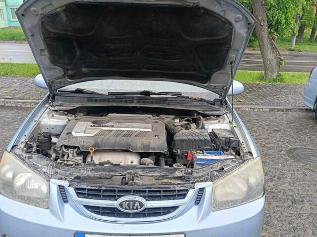 Серый Киа Черато, объемом двигателя 2 л и пробегом 230 тыс. км за 3000 $, фото 8 на Automoto.ua