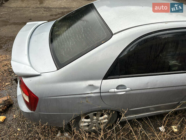 Сірий Кіа Черато, об'ємом двигуна 2 л та пробігом 280 тис. км за 2300 $, фото 12 на Automoto.ua