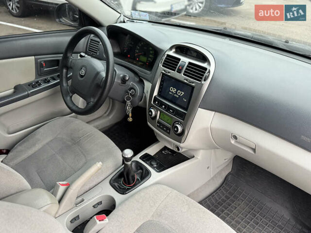 Сірий Кіа Черато, об'ємом двигуна 1.6 л та пробігом 290 тис. км за 3800 $, фото 12 на Automoto.ua