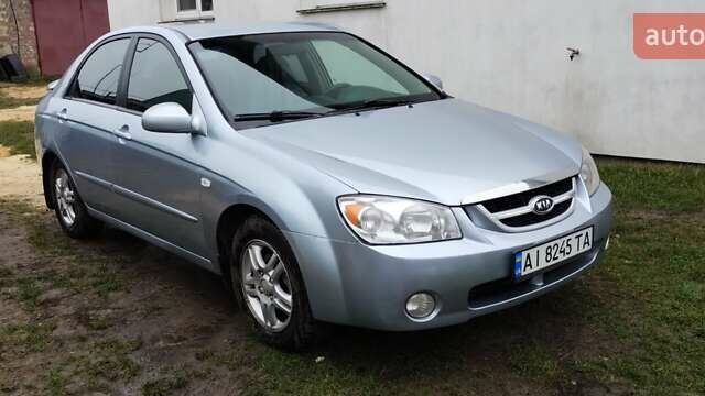 Серый Киа Черато, объемом двигателя 1.98 л и пробегом 240 тыс. км за 3000 $, фото 2 на Automoto.ua