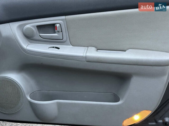 Серый Киа Черато, объемом двигателя 1.98 л и пробегом 213 тыс. км за 4900 $, фото 24 на Automoto.ua