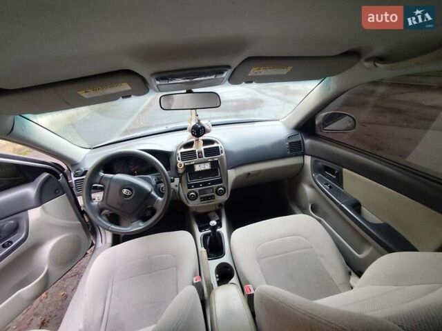 Серый Киа Черато, объемом двигателя 1.6 л и пробегом 200 тыс. км за 3550 $, фото 6 на Automoto.ua