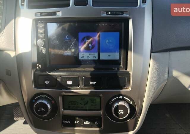 Серый Киа Черато, объемом двигателя 1.98 л и пробегом 255 тыс. км за 4300 $, фото 20 на Automoto.ua