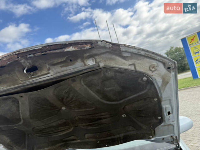 Сірий Кіа Черато, об'ємом двигуна 2 л та пробігом 184 тис. км за 2999 $, фото 10 на Automoto.ua