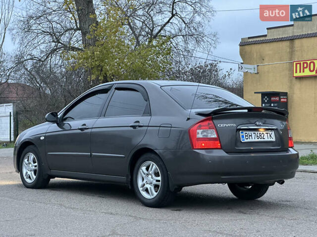 Серый Киа Черато, объемом двигателя 1.98 л и пробегом 213 тыс. км за 4900 $, фото 6 на Automoto.ua