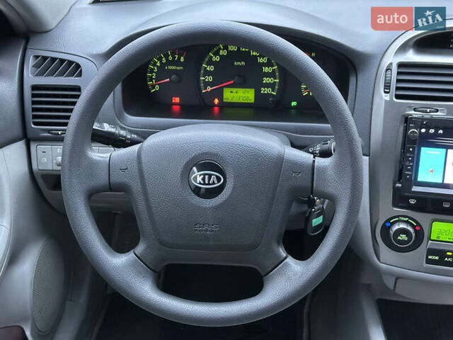 Серый Киа Черато, объемом двигателя 1.98 л и пробегом 213 тыс. км за 4900 $, фото 21 на Automoto.ua