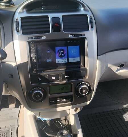 Серый Киа Черато, объемом двигателя 1.98 л и пробегом 255 тыс. км за 4300 $, фото 22 на Automoto.ua