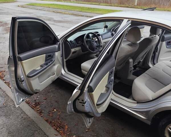 Серый Киа Черато, объемом двигателя 1.6 л и пробегом 200 тыс. км за 3550 $, фото 3 на Automoto.ua