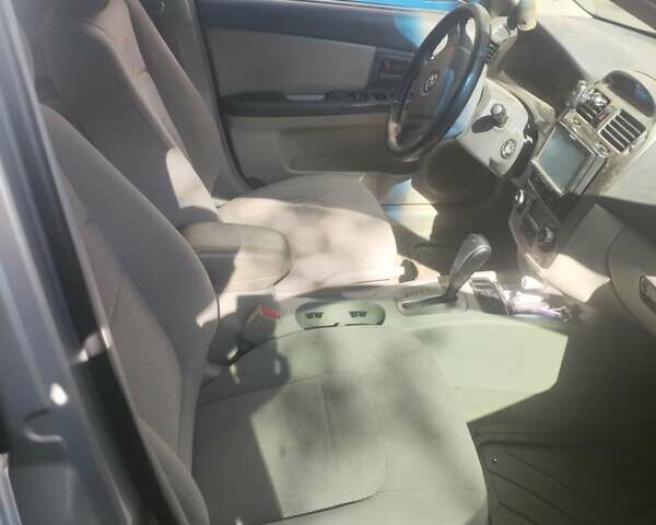 Серый Киа Черато, объемом двигателя 2 л и пробегом 262 тыс. км за 2700 $, фото 5 на Automoto.ua