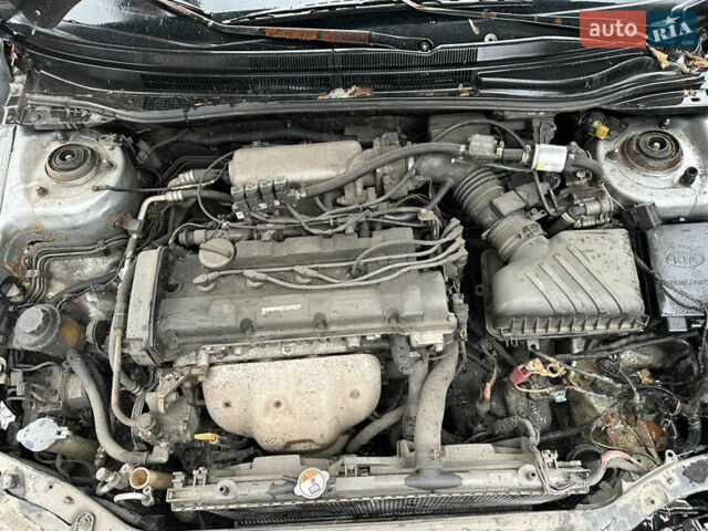 Сірий Кіа Черато, об'ємом двигуна 2 л та пробігом 280 тис. км за 2300 $, фото 4 на Automoto.ua