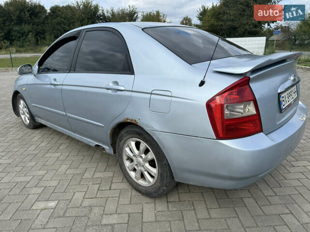 Сірий Кіа Черато, об'ємом двигуна 2 л та пробігом 184 тис. км за 2999 $, фото 4 на Automoto.ua