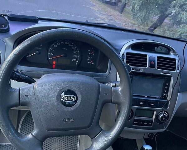 Сірий Кіа Черато, об'ємом двигуна 2 л та пробігом 350 тис. км за 4100 $, фото 3 на Automoto.ua