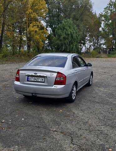 Сірий Кіа Черато, об'ємом двигуна 1.6 л та пробігом 259 тис. км за 4000 $, фото 7 на Automoto.ua