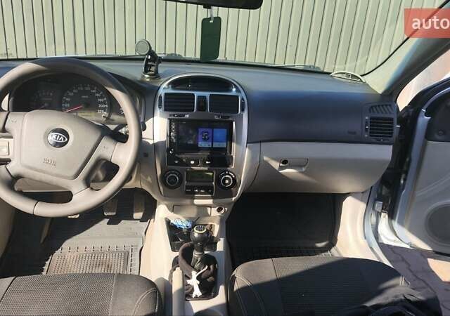 Серый Киа Черато, объемом двигателя 1.98 л и пробегом 255 тыс. км за 4300 $, фото 23 на Automoto.ua