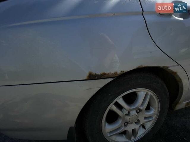 Сірий Кіа Черато, об'ємом двигуна 1.6 л та пробігом 180 тис. км за 4300 $, фото 12 на Automoto.ua