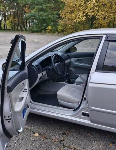 Сірий Кіа Черато, об'ємом двигуна 1.6 л та пробігом 259 тис. км за 4000 $, фото 6 на Automoto.ua