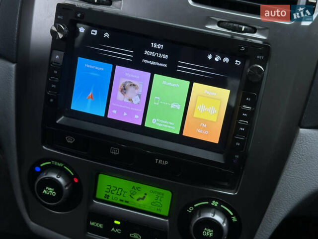 Серый Киа Черато, объемом двигателя 1.98 л и пробегом 213 тыс. км за 4900 $, фото 31 на Automoto.ua