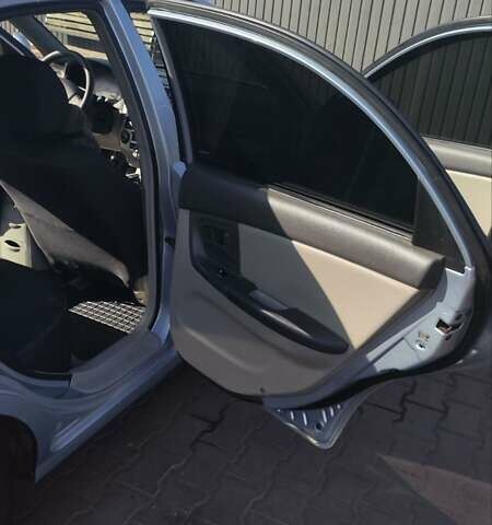 Серый Киа Черато, объемом двигателя 1.98 л и пробегом 255 тыс. км за 4300 $, фото 14 на Automoto.ua