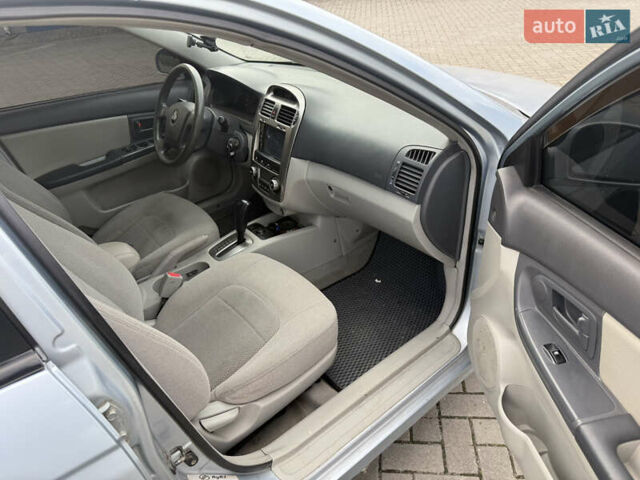 Сірий Кіа Черато, об'ємом двигуна 2 л та пробігом 184 тис. км за 2999 $, фото 11 на Automoto.ua