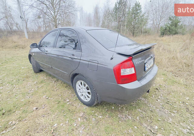 Серый Киа Черато, объемом двигателя 2 л и пробегом 180 тыс. км за 3800 $, фото 8 на Automoto.ua