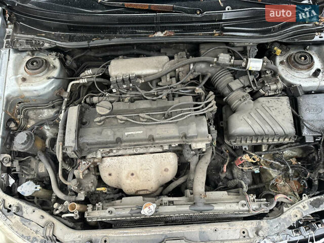 Сірий Кіа Черато, об'ємом двигуна 2 л та пробігом 280 тис. км за 2300 $, фото 1 на Automoto.ua
