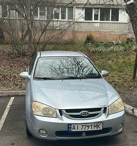 Серый Киа Черато, объемом двигателя 2 л и пробегом 214 тыс. км за 4700 $, фото 2 на Automoto.ua