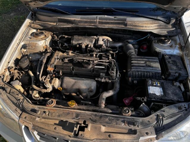 Серый Киа Черато, объемом двигателя 1.6 л и пробегом 250 тыс. км за 2700 $, фото 7 на Automoto.ua