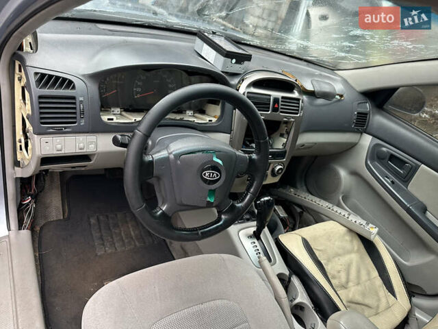 Сірий Кіа Черато, об'ємом двигуна 2 л та пробігом 280 тис. км за 2100 $, фото 15 на Automoto.ua