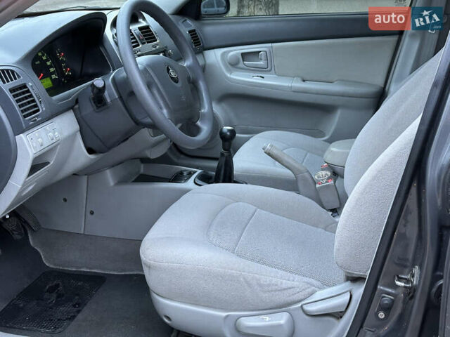 Серый Киа Черато, объемом двигателя 1.98 л и пробегом 213 тыс. км за 4900 $, фото 8 на Automoto.ua