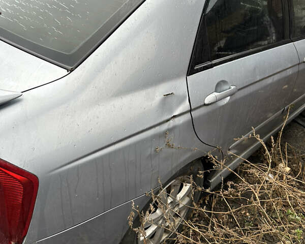 Сірий Кіа Черато, об'ємом двигуна 2 л та пробігом 280 тис. км за 2100 $, фото 6 на Automoto.ua