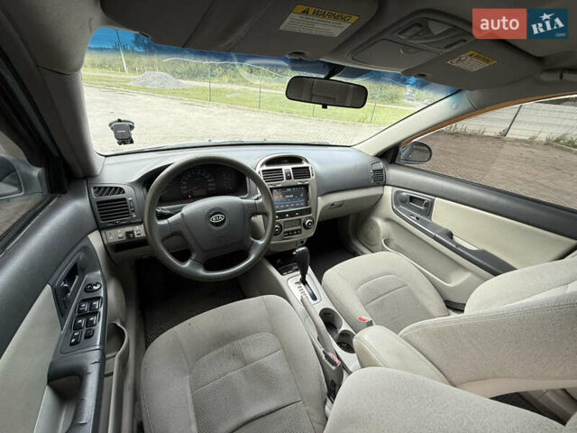 Сірий Кіа Черато, об'ємом двигуна 2 л та пробігом 184 тис. км за 2999 $, фото 15 на Automoto.ua
