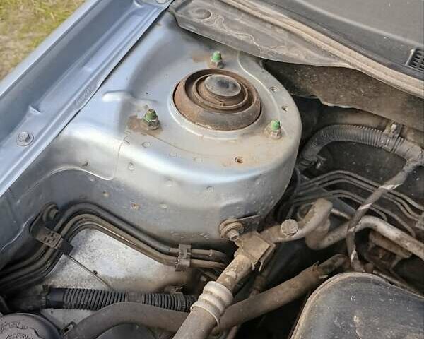 Серый Киа Черато, объемом двигателя 1.59 л и пробегом 184 тыс. км за 4100 $, фото 7 на Automoto.ua