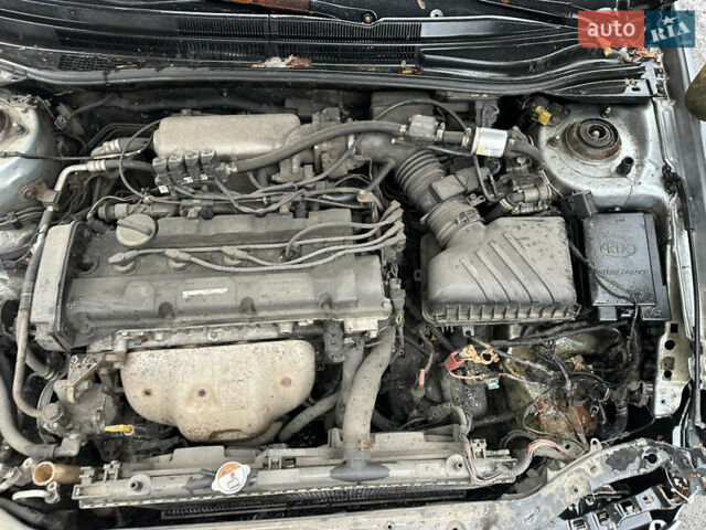 Сірий Кіа Черато, об'ємом двигуна 2 л та пробігом 280 тис. км за 2300 $, фото 3 на Automoto.ua