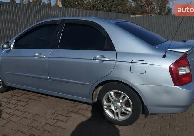 Серый Киа Черато, объемом двигателя 1.98 л и пробегом 255 тыс. км за 4300 $, фото 4 на Automoto.ua