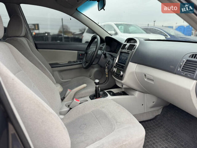 Сірий Кіа Черато, об'ємом двигуна 1.6 л та пробігом 290 тис. км за 3800 $, фото 11 на Automoto.ua