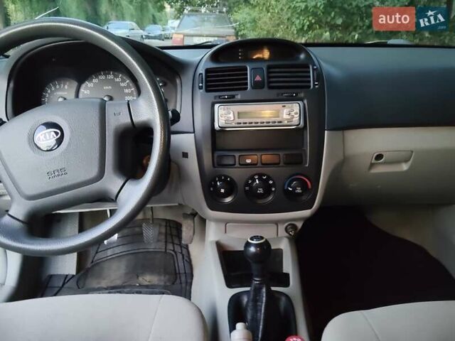 Серый Киа Черато, объемом двигателя 1.6 л и пробегом 89 тыс. км за 2800 $, фото 8 на Automoto.ua