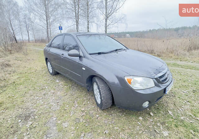 Серый Киа Черато, объемом двигателя 2 л и пробегом 180 тыс. км за 3800 $, фото 3 на Automoto.ua