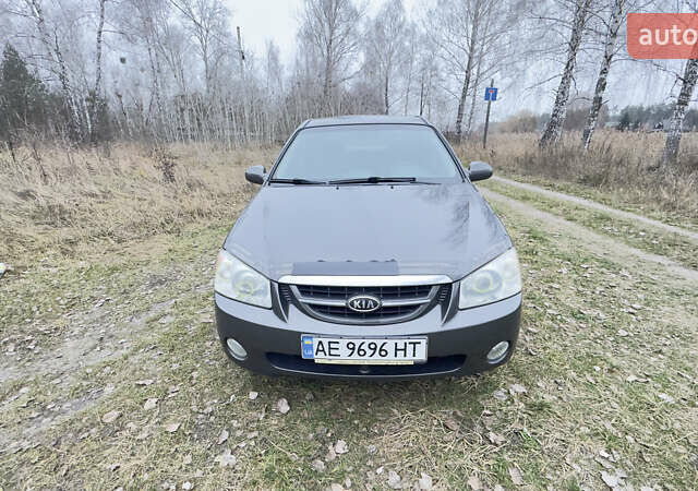 Серый Киа Черато, объемом двигателя 2 л и пробегом 180 тыс. км за 3800 $, фото 11 на Automoto.ua