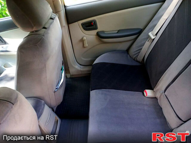 Серый Киа Черато, объемом двигателя 1.6 л и пробегом 300 тыс. км за 3900 $, фото 4 на Automoto.ua